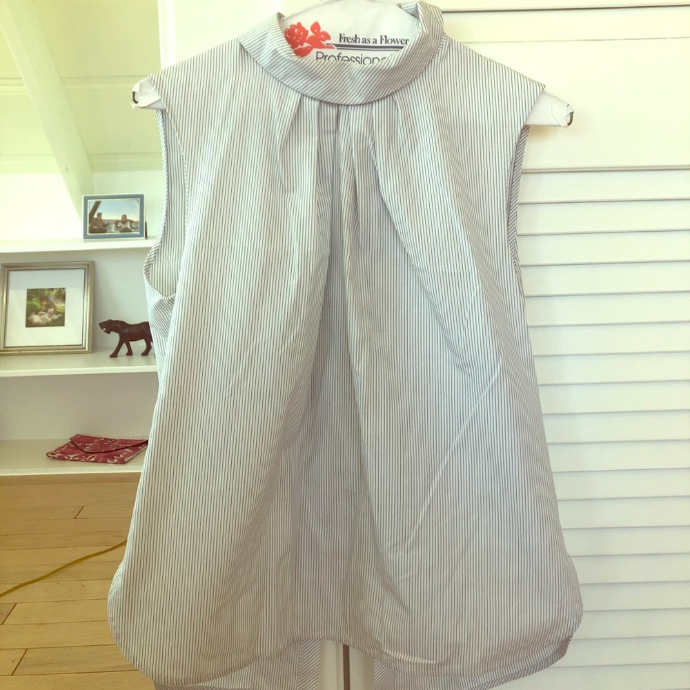 Polished open back sleeveless Sandro top